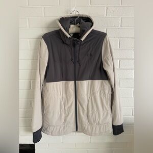 The North Face lightweight jacket. Color block tans and gray. Hooded zip up.